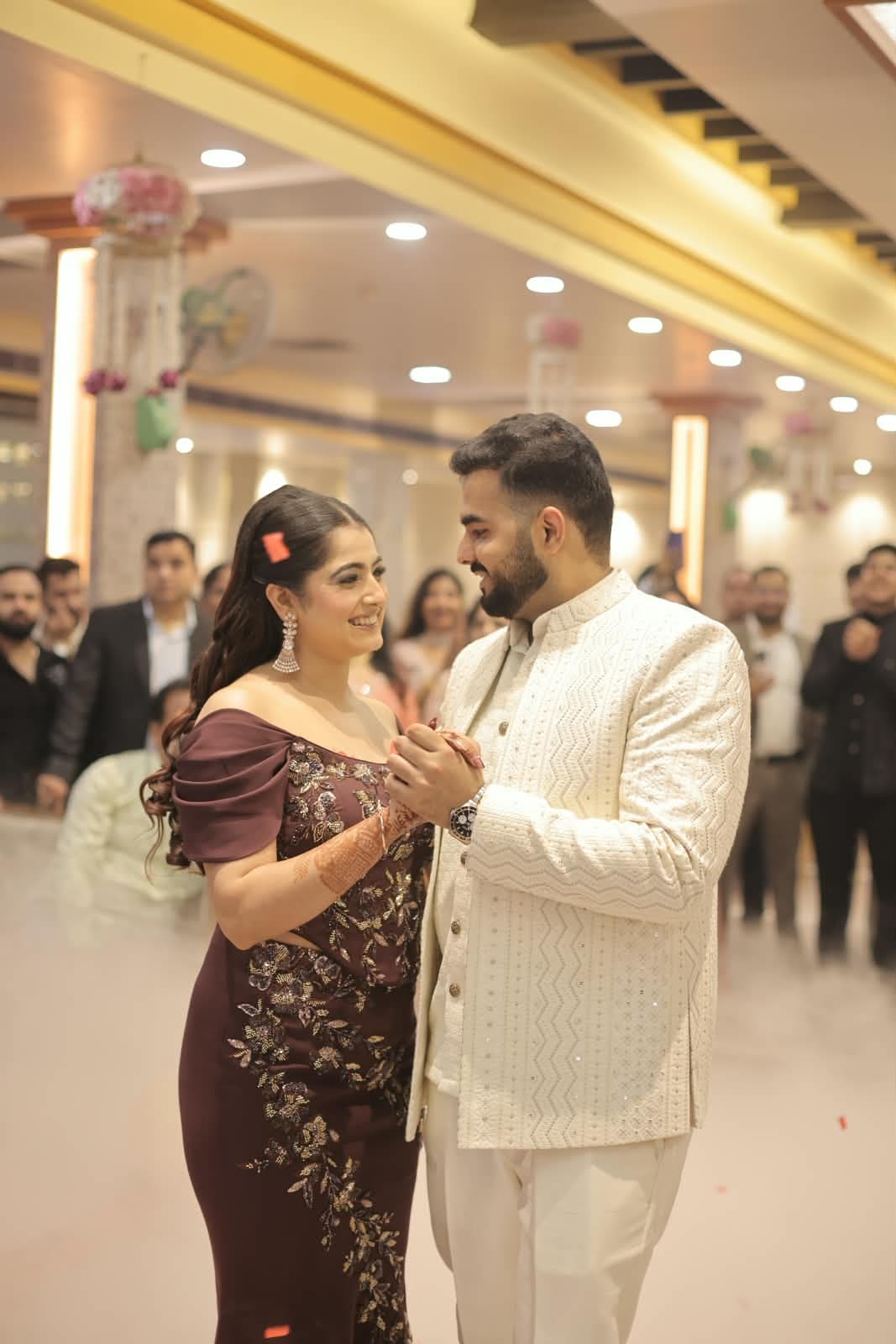 Ansh and Vanshika dancing together at their wedding celebration